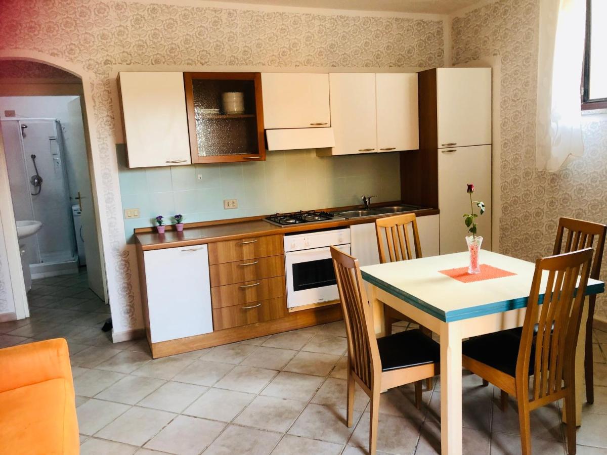Le Residenze Itaca Lägenhet Porto Pozzo Exteriör bild