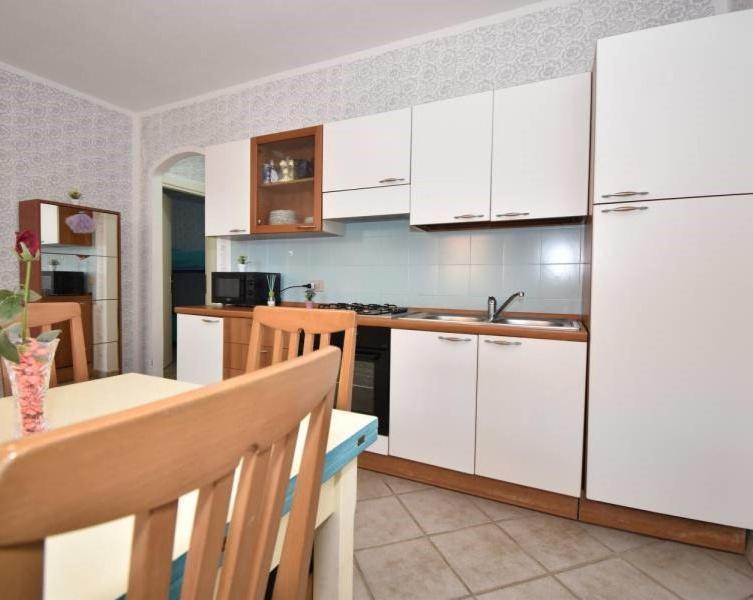 Le Residenze Itaca Lägenhet Porto Pozzo Exteriör bild